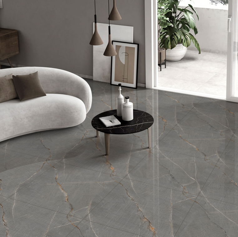 Modern living room with gray marble flooring, white sofa, and black coffee table.
